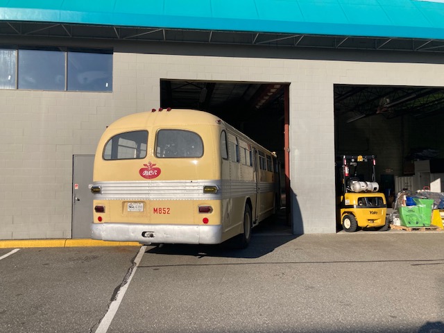 A bus parked in a parking garage Description automatically generated with low confidence